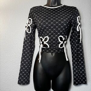 ASOS women’s reclaimed vintage all over print Cutout Long Sleeve Crop Top Black